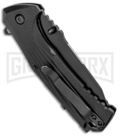 Schrade U.G. Black Folding Knife W/ Firestarter - Black -Knivesand Tools Shop Schrade U.G. LL Black Firestarter Black 1100046 BHQ 93631 jr side large