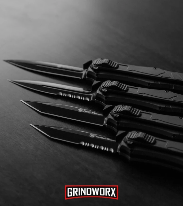 Smith & Wesson Spring Assisted Finger Actuator Tanto OTF Knife - Black Serr Smith & Wesson Spring Assisted Finger Actuator Tanto OTF Knife - Black Serr -Knivesand Tools Shop Smith Wesson OTF Assist Finger Actuator SWOTF9 B BHQ 67476 BS BHQ 67475 TB BHQ 67477 TBS BHQ 67474 jr lifestyle large 2